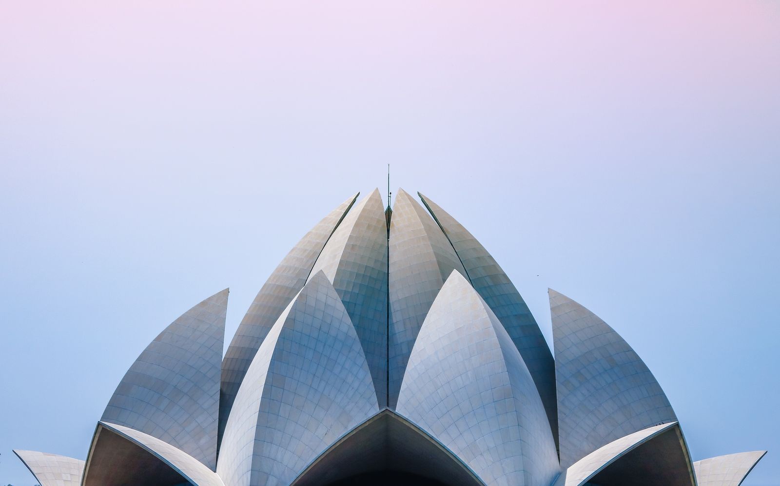 Lotus Temple petals against a soft pastel sky, New Delhi