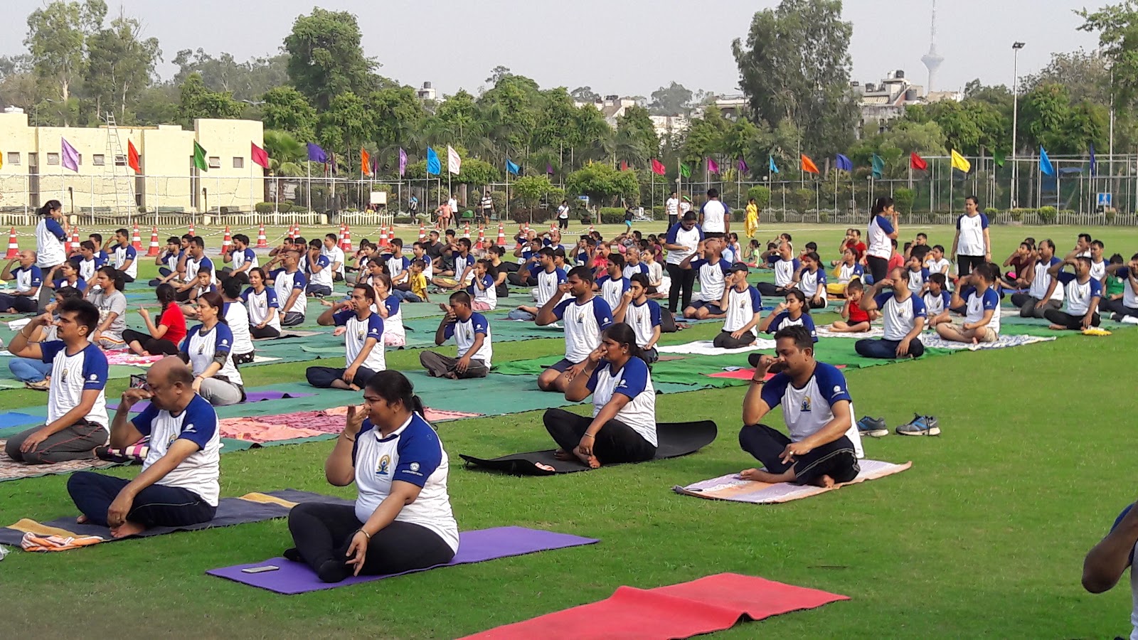Morning yoga session on the lawns of Major Dhyan Chand Sports Complex
