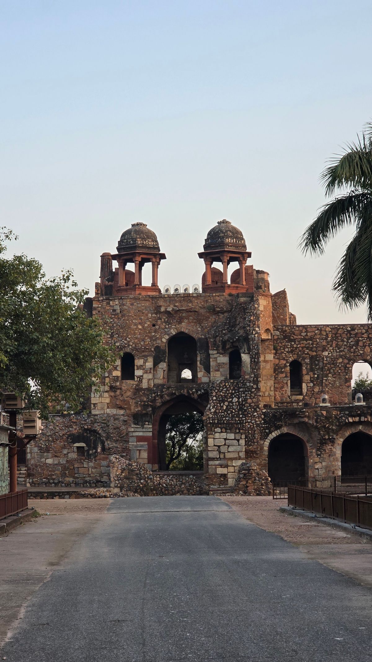 Ancient gate of Purana Qila fort with domed chhatris, New Delhi